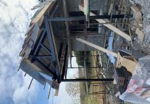 Black feature trusses of covered veranda 