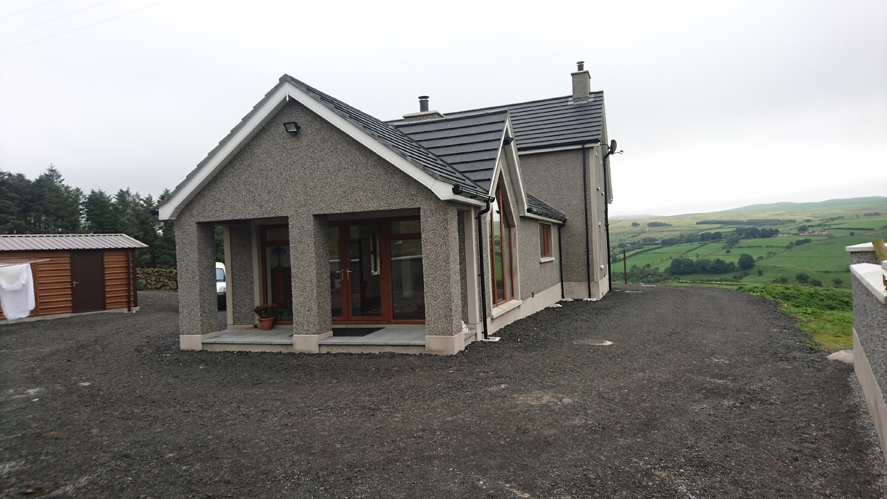 back of dwelling with covered veranda 