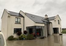 Self-Build home with large corner window for open plan kitchen dining area 