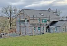 Back view of bespoke home with country views 