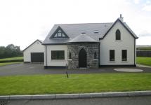 Front view of home with stone work 