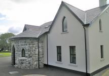 side view of rounded front with stone work 