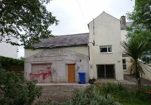 Back of home before demolition 