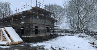 Roof Trusses waiting to go on 