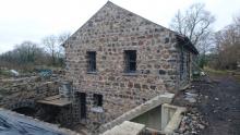 stone work added, old mill with new extensions 